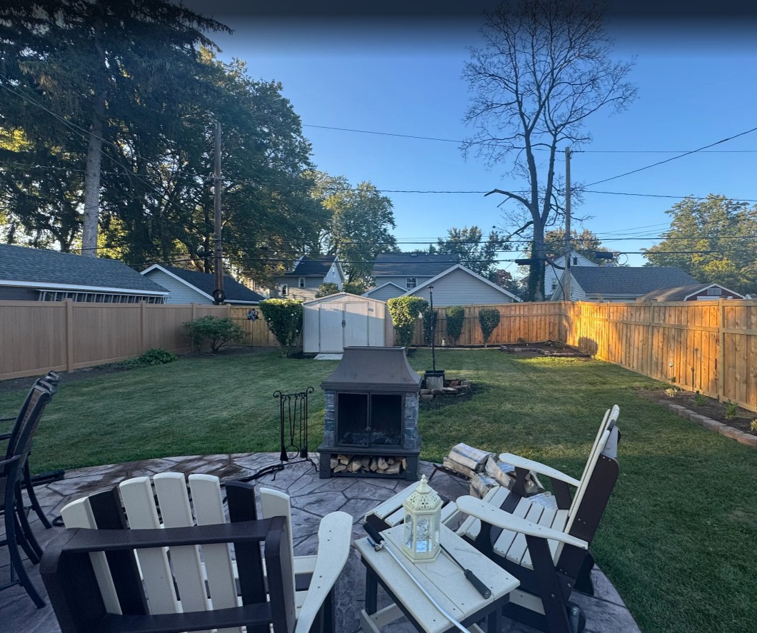 Freshly mowed backyard at a residential property in Rochester, NY