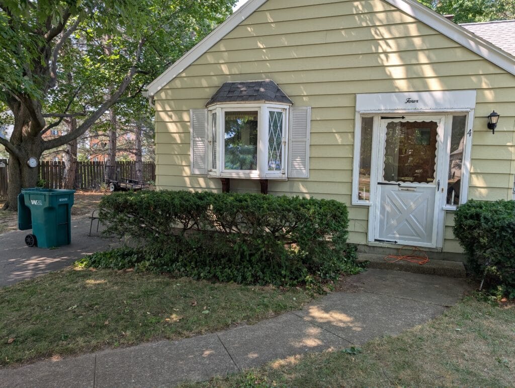 Freshly trimmed bushes improving curb appeal in Irondequoit NY