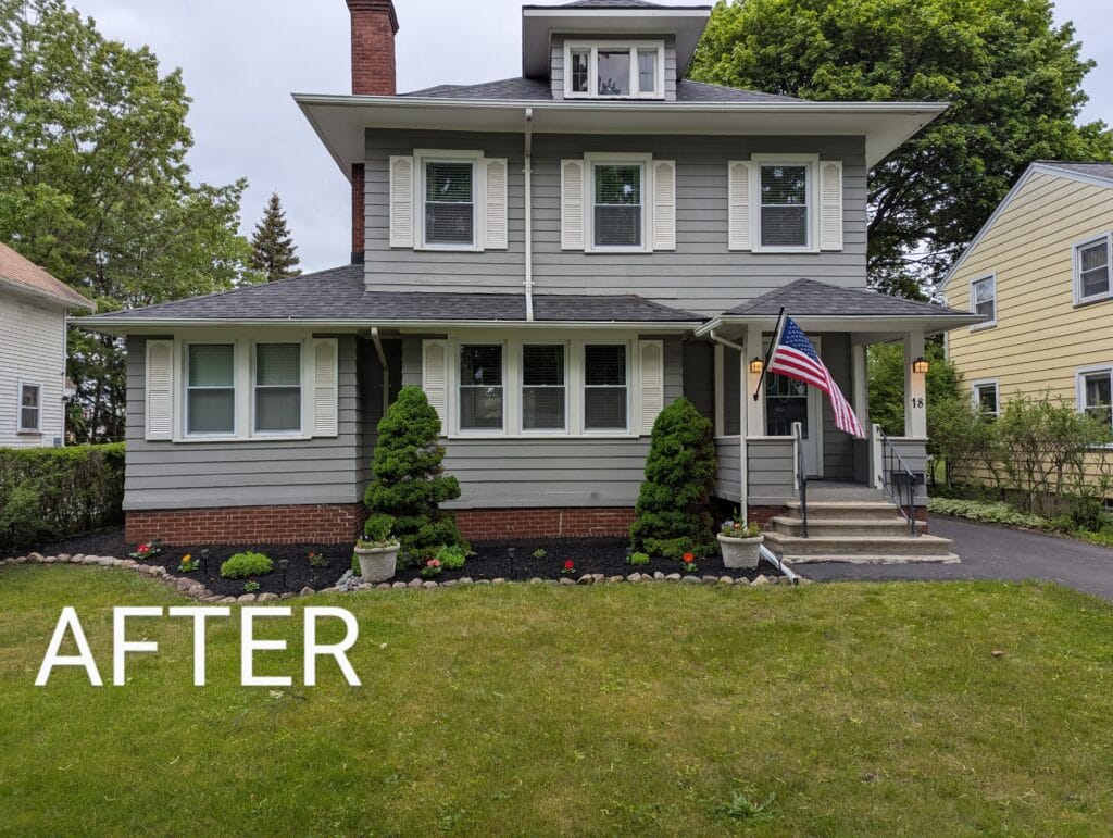Freshly mulched garden with new annuals and perennials in Irondequoit NY
