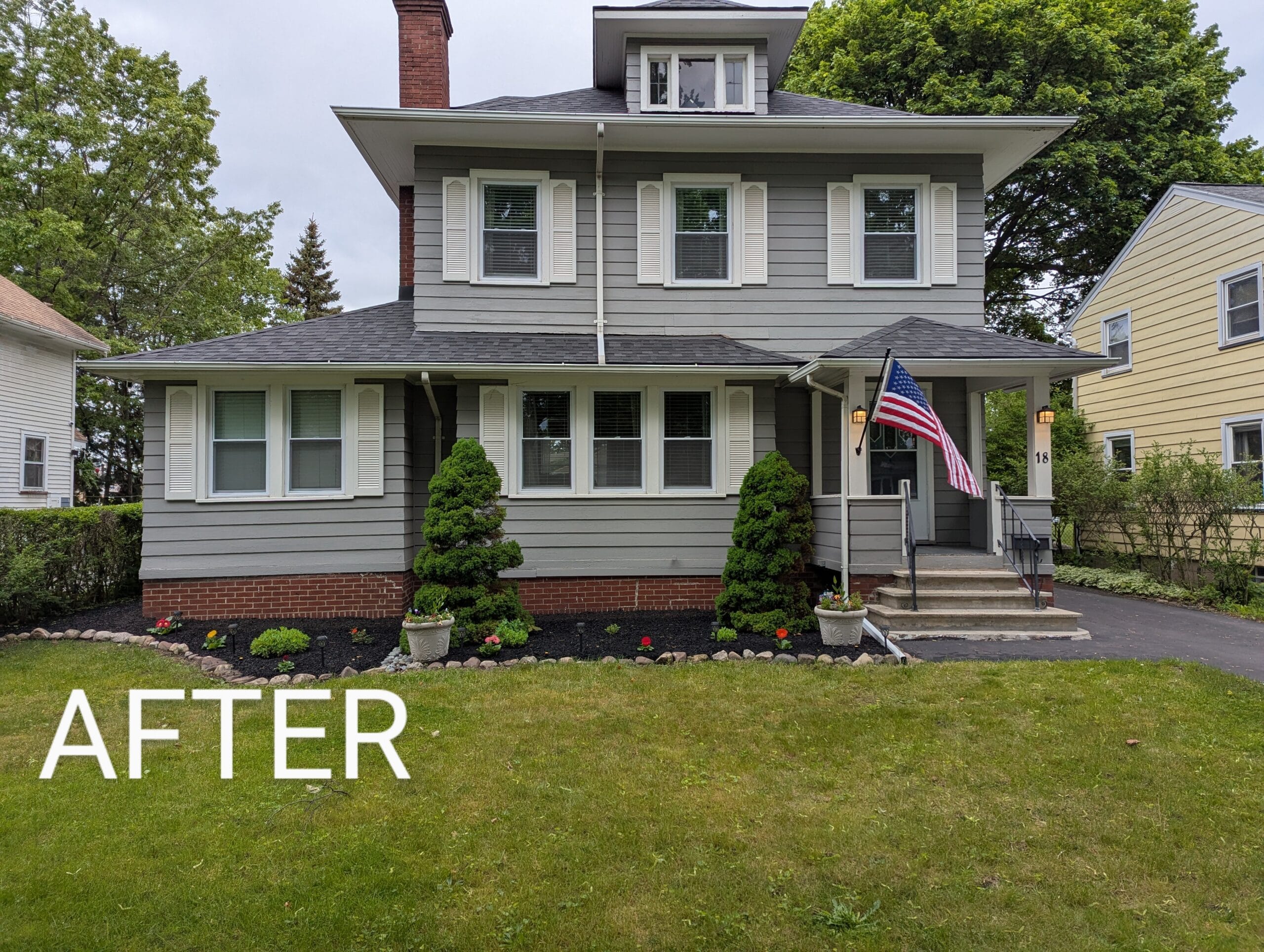 Freshly mulched garden with new annuals and perennials in Irondequoit NY