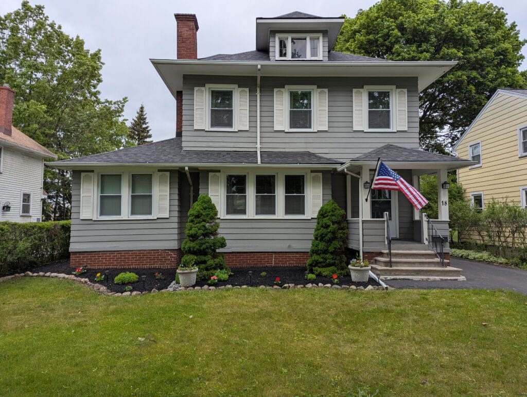 Freshly mulched garden with new annuals and perennials in Irondequoit NY
