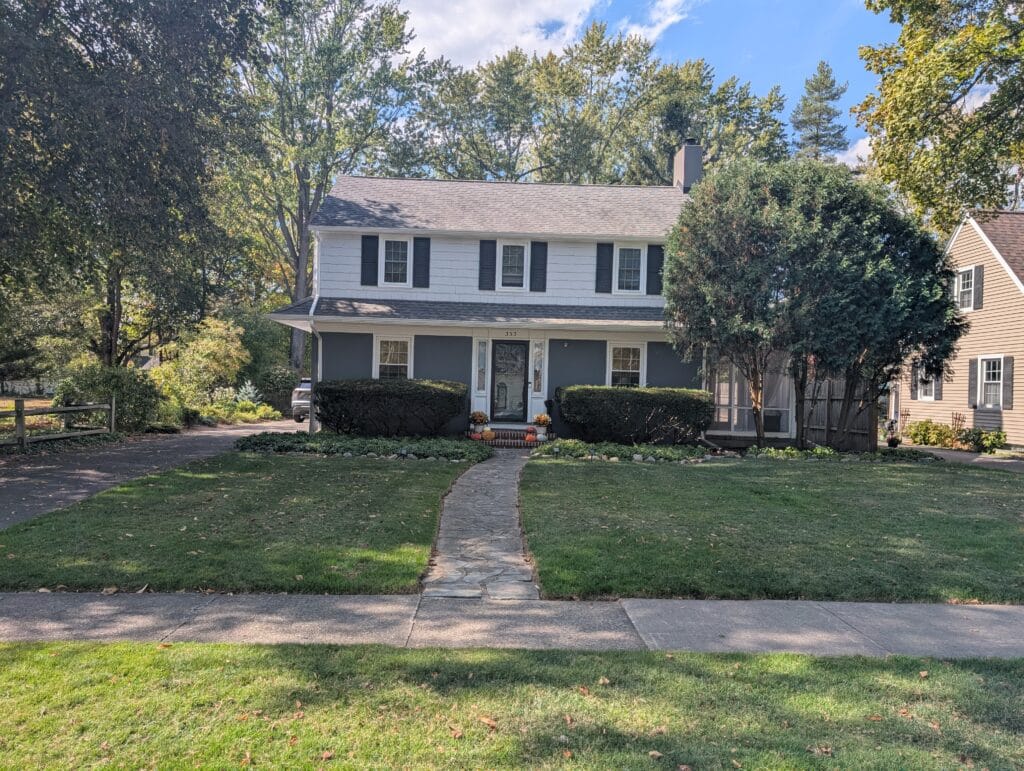 Front yard with newly edged sidewalks in Brighton NY