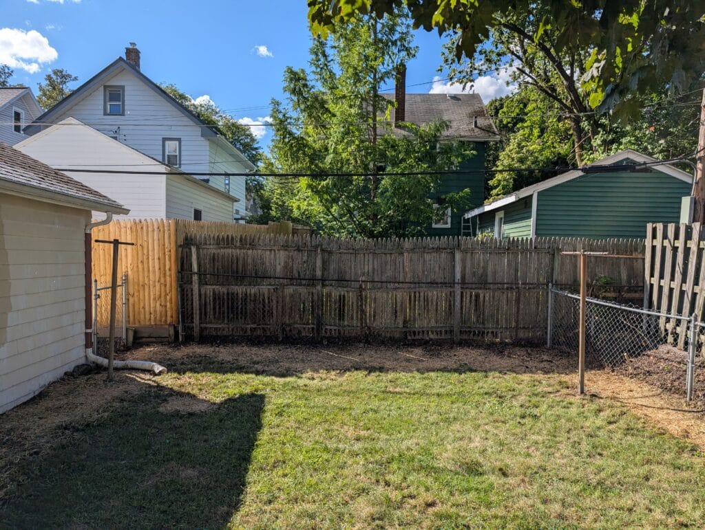 Full backyard after complete yard cleanup in Rochester NY