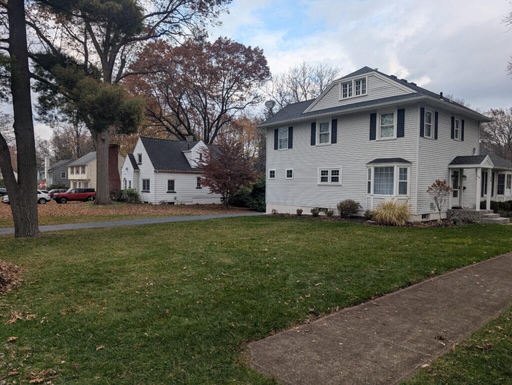 Front yard after leaf removal using vacuum truck in Irondequoit NY
