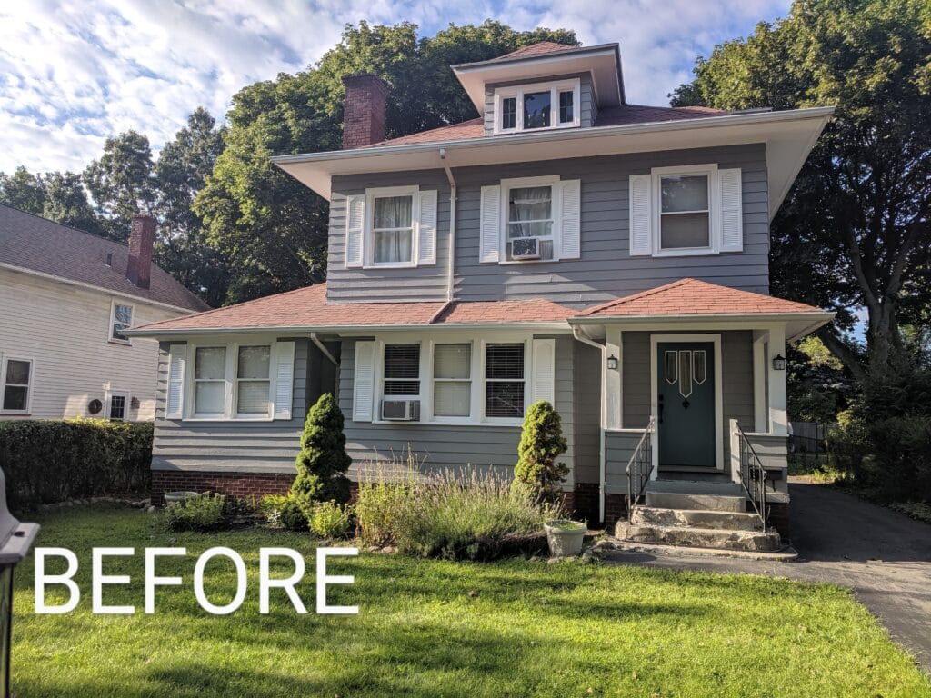 Overgrown garden bed before mulching in Irondequoit NY