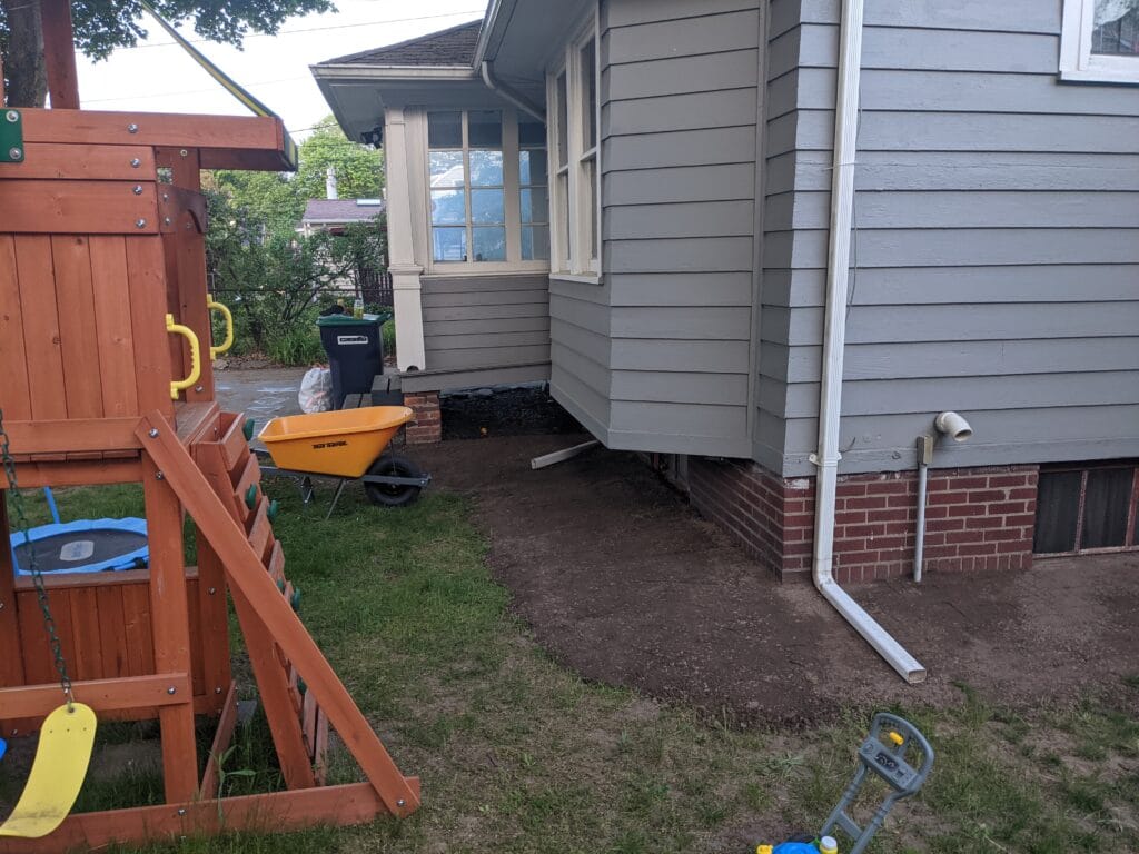 Regraded soil sloping away from a home in Irondequoit NY